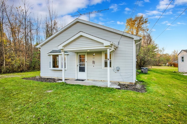 bungalow with a front lawn