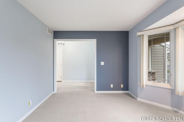 view of carpeted spare room