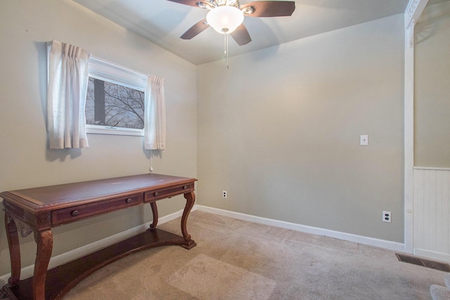 misc room featuring light carpet and ceiling fan