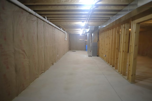 basement featuring heating unit