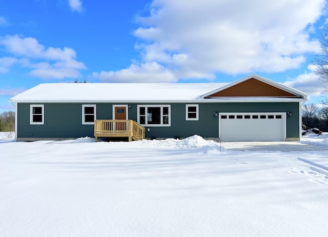 ranch-style home featuring a garage