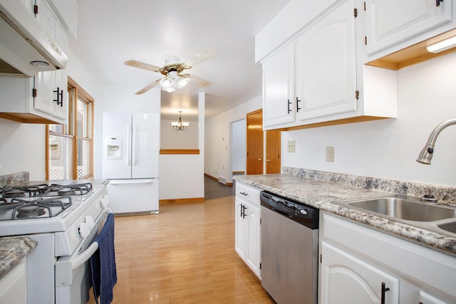 kitchen with white cabinetry, sink, light hardwood / wood-style flooring, white appliances, and ceiling fan with notable chandelier