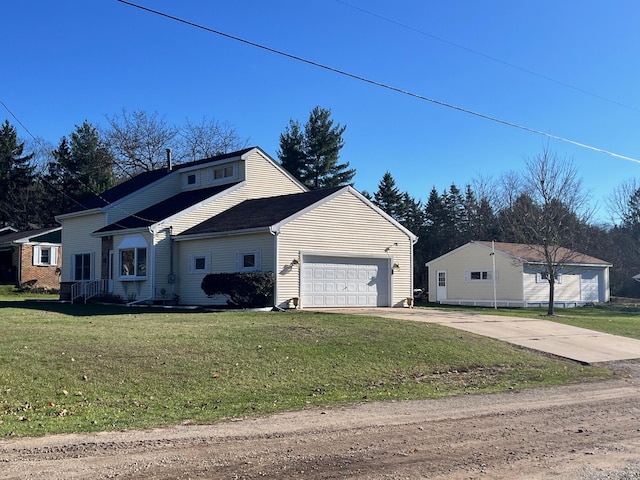 view of front of property with a front yard and a garage