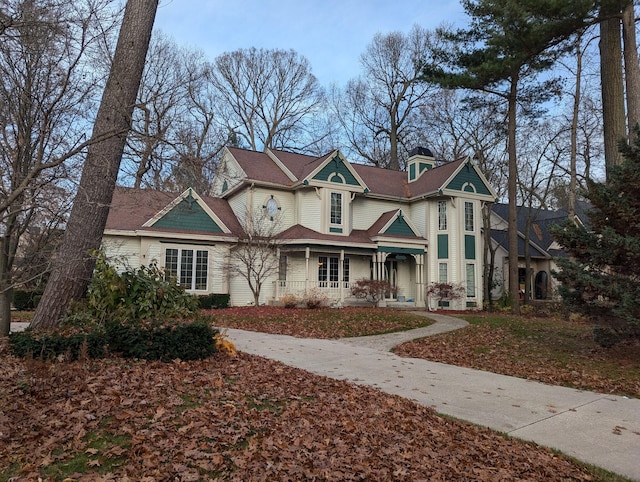 victorian-style house with a porch