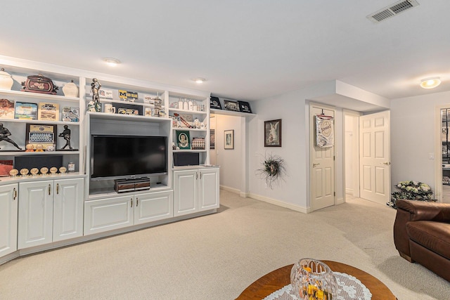 living room with light colored carpet