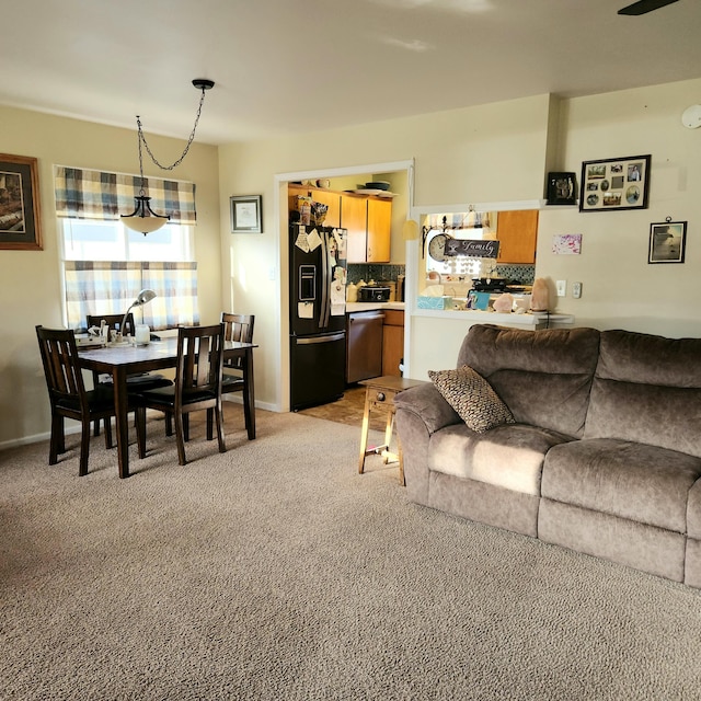 living room featuring light colored carpet