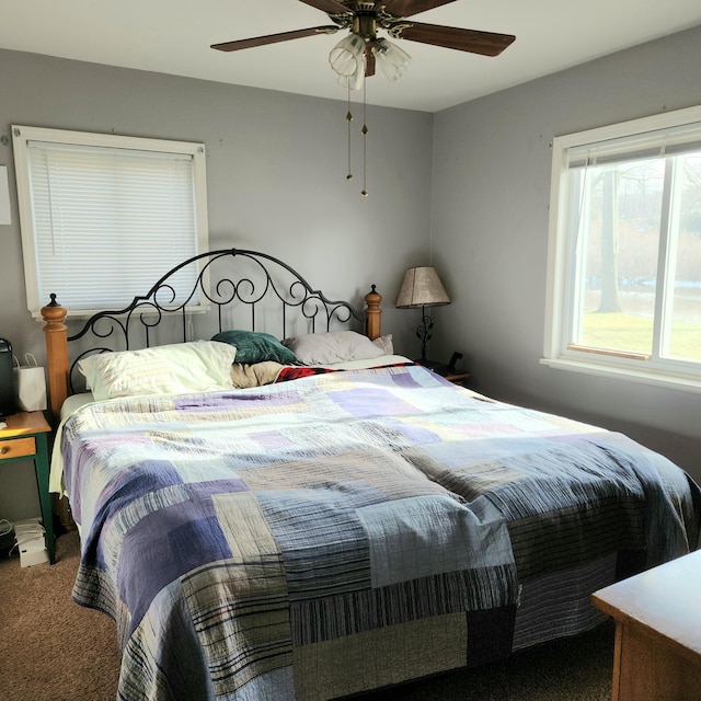 bedroom with carpet and ceiling fan