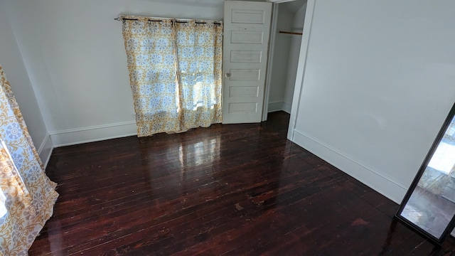 interior space with dark wood-type flooring