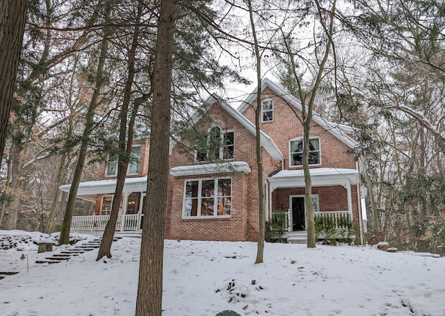 view of property featuring covered porch