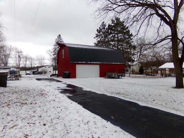 view of snow covered garage