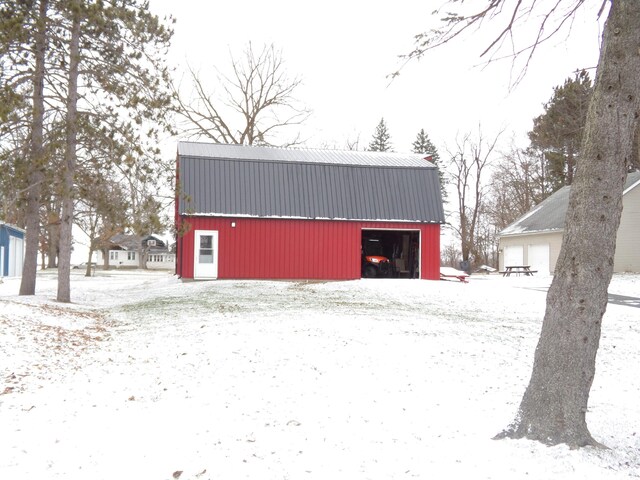 view of snow covered garage