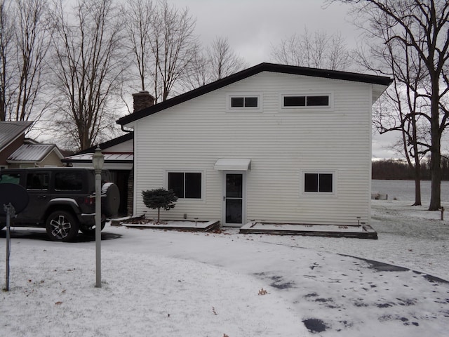 view of snow covered property