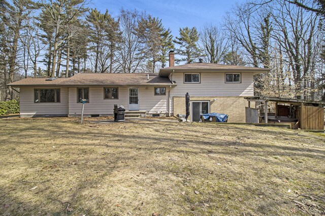7293 M-116, Ludington, MI 49431 - back of property featuring a lawn and a chimney