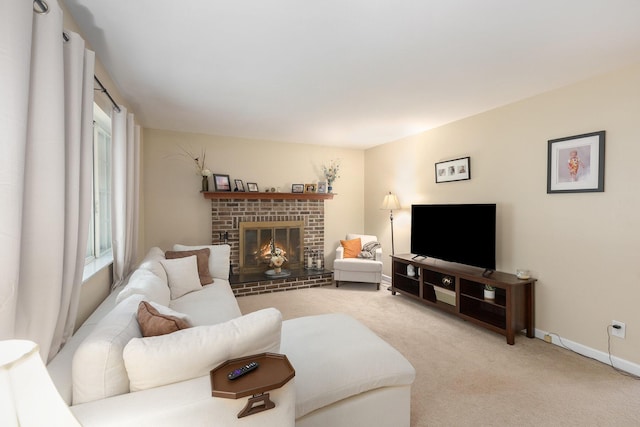 carpeted living room featuring a brick fireplace