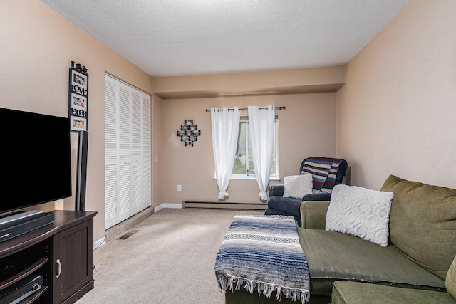 living room with a textured ceiling, light carpet, and a baseboard radiator