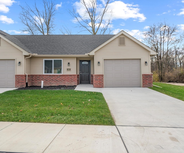 ranch-style house with a garage and a front lawn