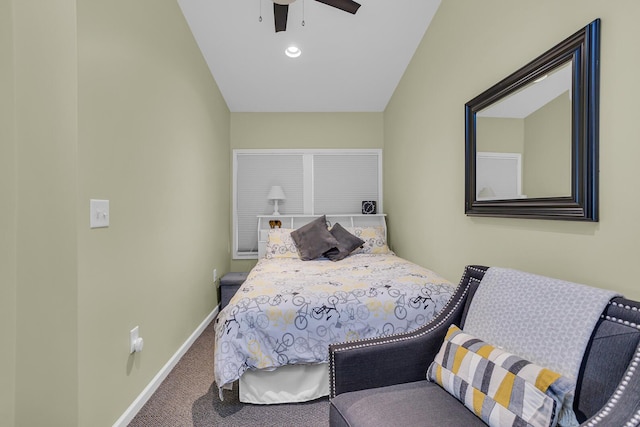 carpeted bedroom with vaulted ceiling and ceiling fan