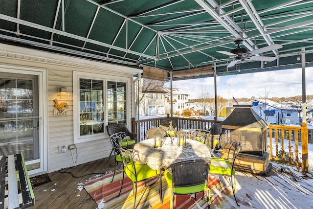 snow covered deck with ceiling fan