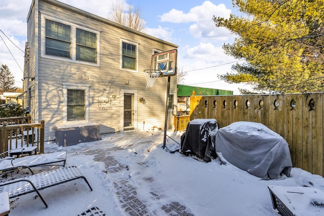 view of snow covered house