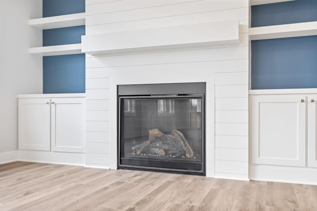 interior details featuring hardwood / wood-style floors