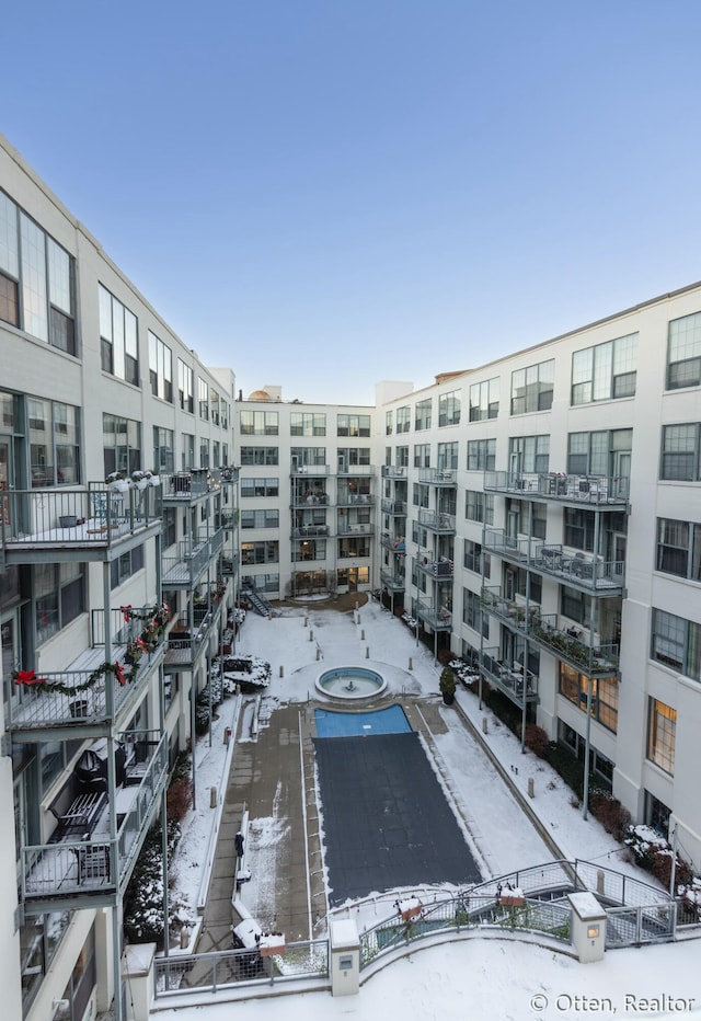 view of snow covered property