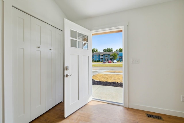 foyer with light wood-type flooring