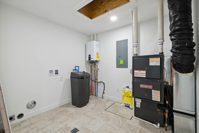 utility room featuring electric panel, tankless water heater, and heating unit