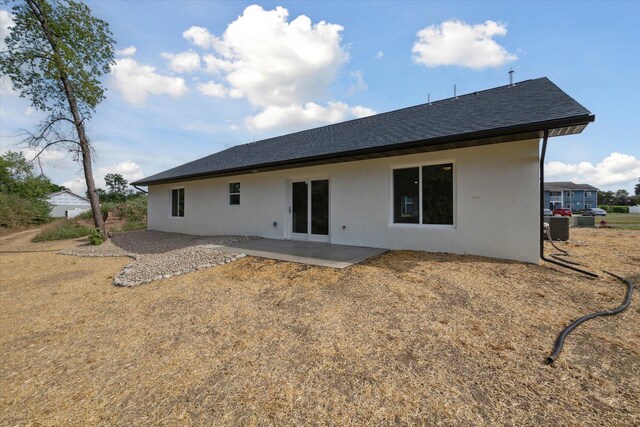 rear view of property with a patio