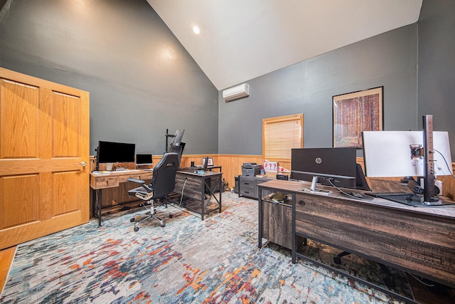 office space with a wall mounted air conditioner, high vaulted ceiling, and wooden walls