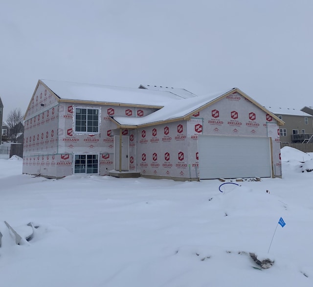 unfinished property featuring a garage