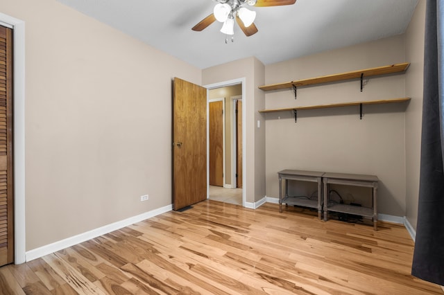 unfurnished bedroom featuring light wood-type flooring, a closet, and ceiling fan