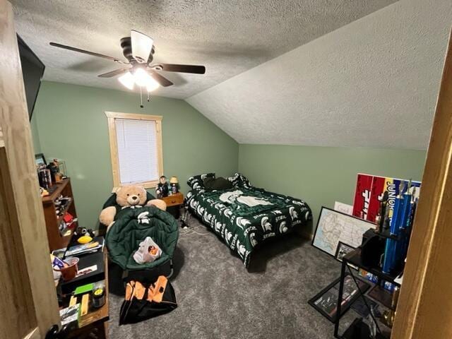 carpeted bedroom featuring a textured ceiling, ceiling fan, and lofted ceiling