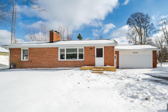 single story home with a garage