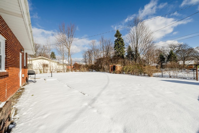 view of snowy yard