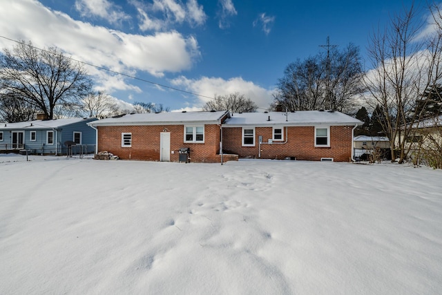 view of snow covered house