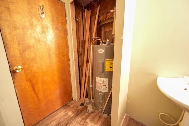 utilities with water heater and sink