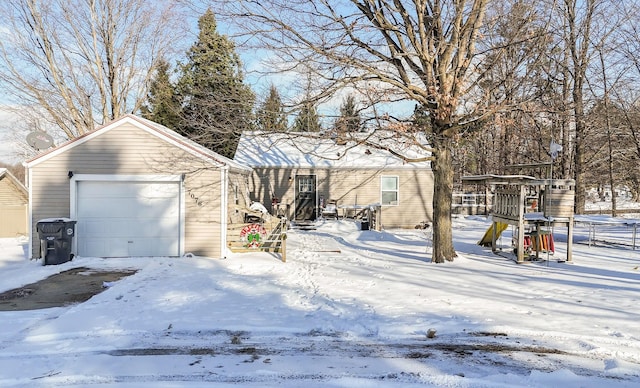 view of snow covered garage