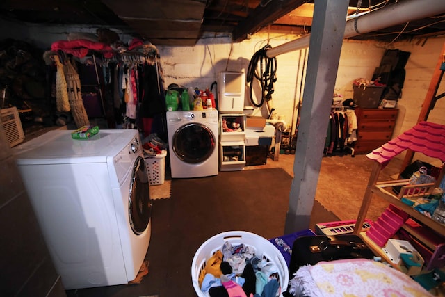 washroom featuring independent washer and dryer