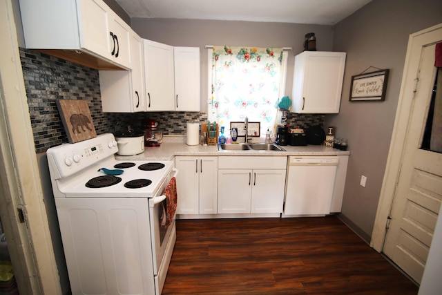 kitchen with dark hardwood / wood-style flooring, white appliances, white cabinetry, and sink