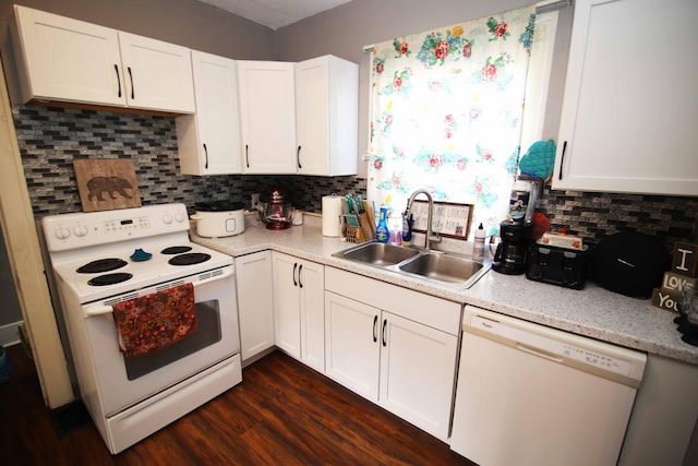 kitchen with white cabinetry, sink, dark hardwood / wood-style flooring, white appliances, and decorative backsplash