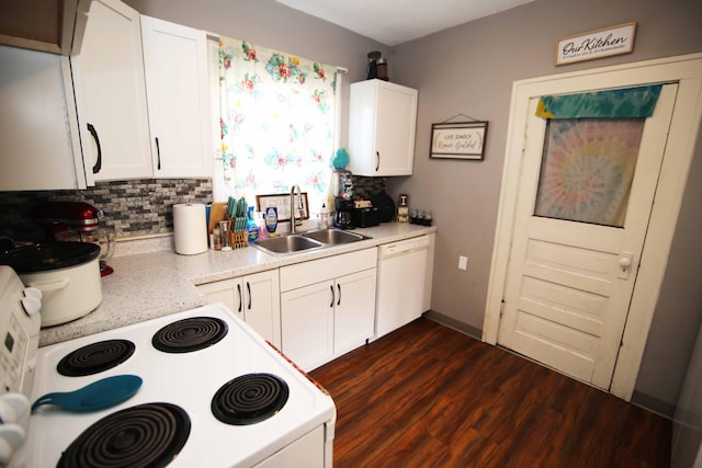 kitchen featuring sink, white cabinets, dark hardwood / wood-style floors, and white appliances