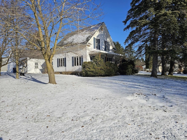 view of snow covered property