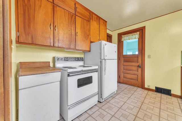 kitchen featuring white appliances