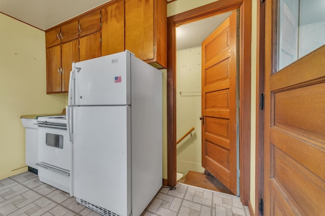 kitchen featuring white appliances