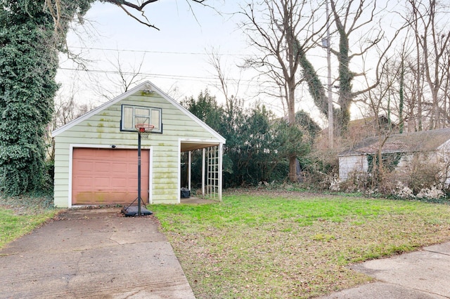 exterior space featuring a yard and a garage