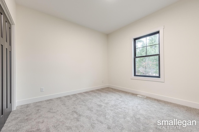 empty room featuring carpet