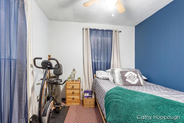 bedroom with ceiling fan and carpet floors