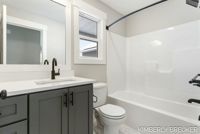 full bathroom featuring shower / tub combination, vanity, and toilet