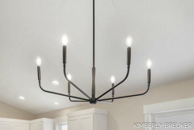 details with an inviting chandelier