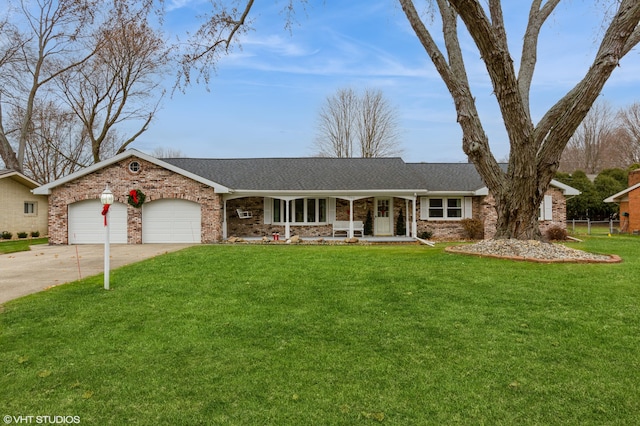 ranch-style home with a front yard and a garage